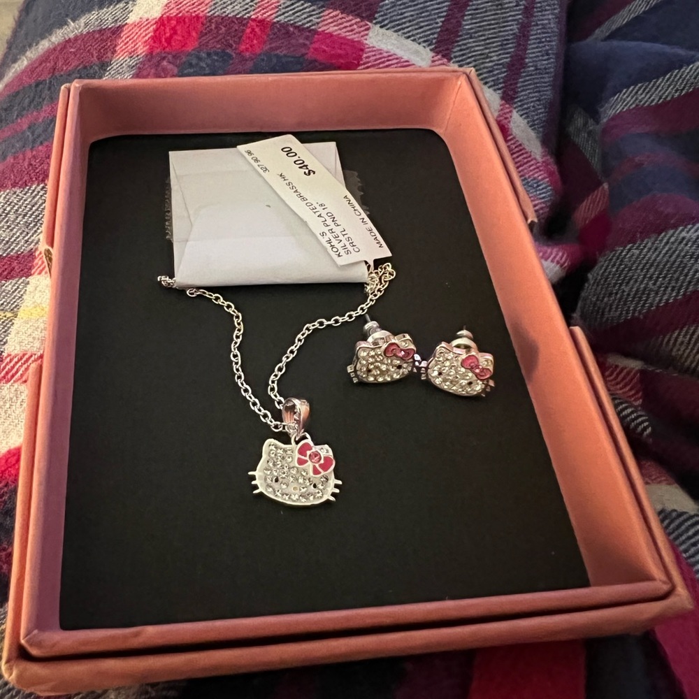 NWT silver plated Hello Kitty necklace and earrings